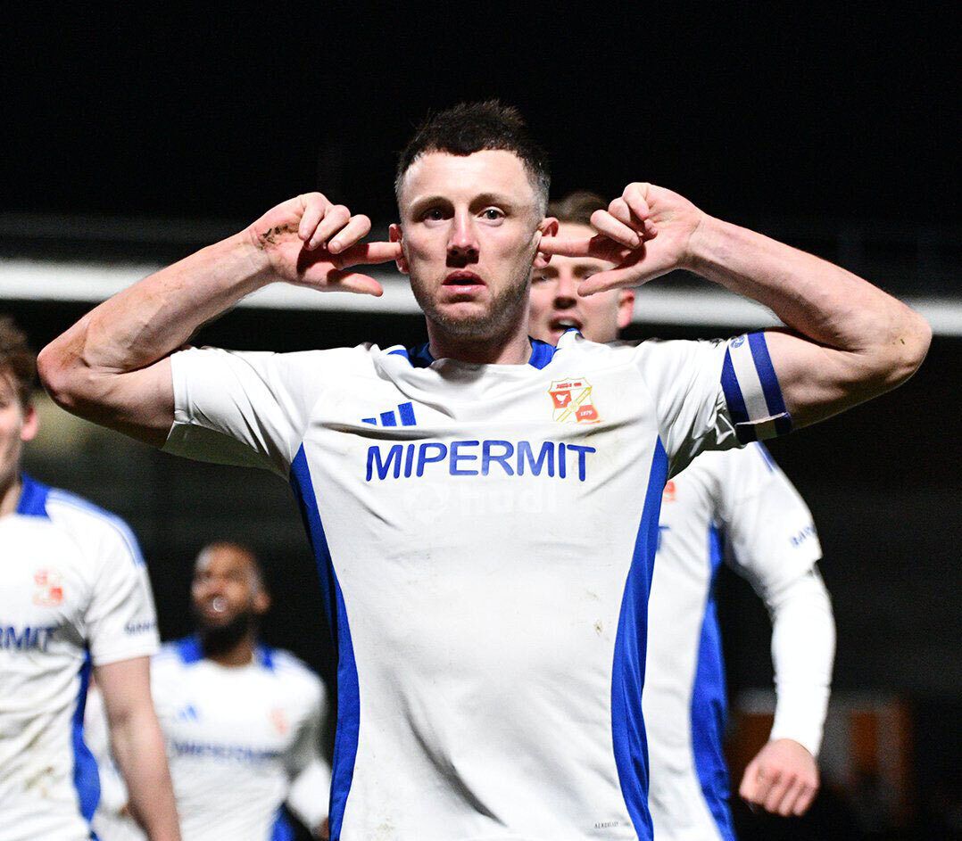 Ollie Clarke celebrates his goal against Barnet